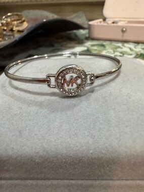 Michael Kors Silver Tone MK Crystal Round Logo Bangle Bracelet